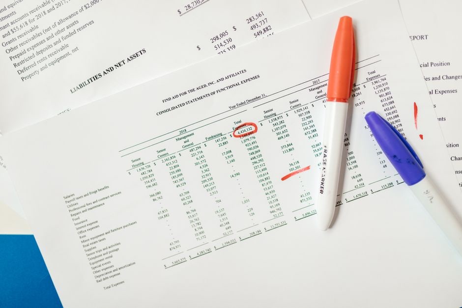 A close-up of a spreadsheet displaying highlighted rows of duplicate contact information, illustrating the problem of messy data.